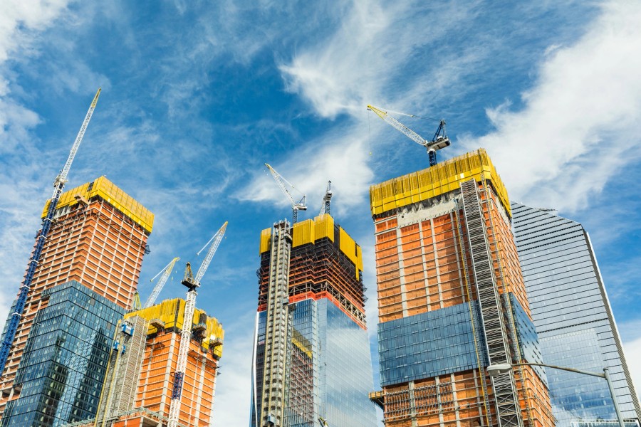 Skyscraper construction site with cranes