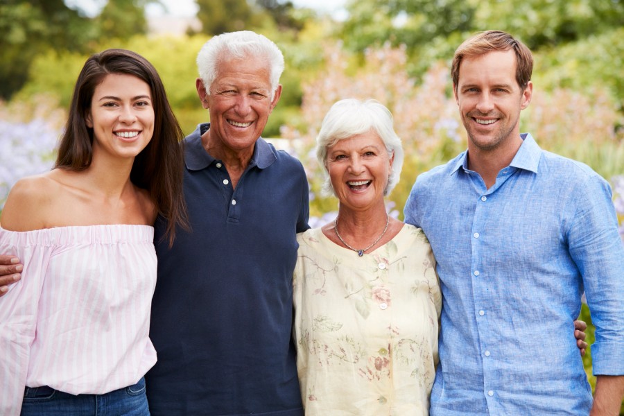Multi-generational family portrait outdoors